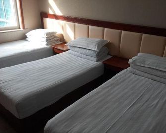 Xiangzheng Hotel - 晉中 - 臥室