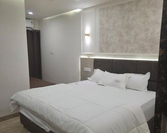 Kiwi Inn Hotel Regional Park - Indore - Ložnice