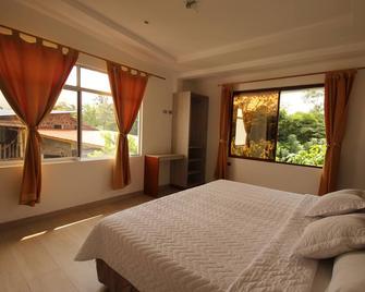 Lava House Hostal - Puerto Ayora - Yatak Odası