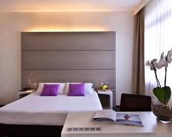 Th Assisi - Hotel Cenacolo - אסיסי - חדר שינה