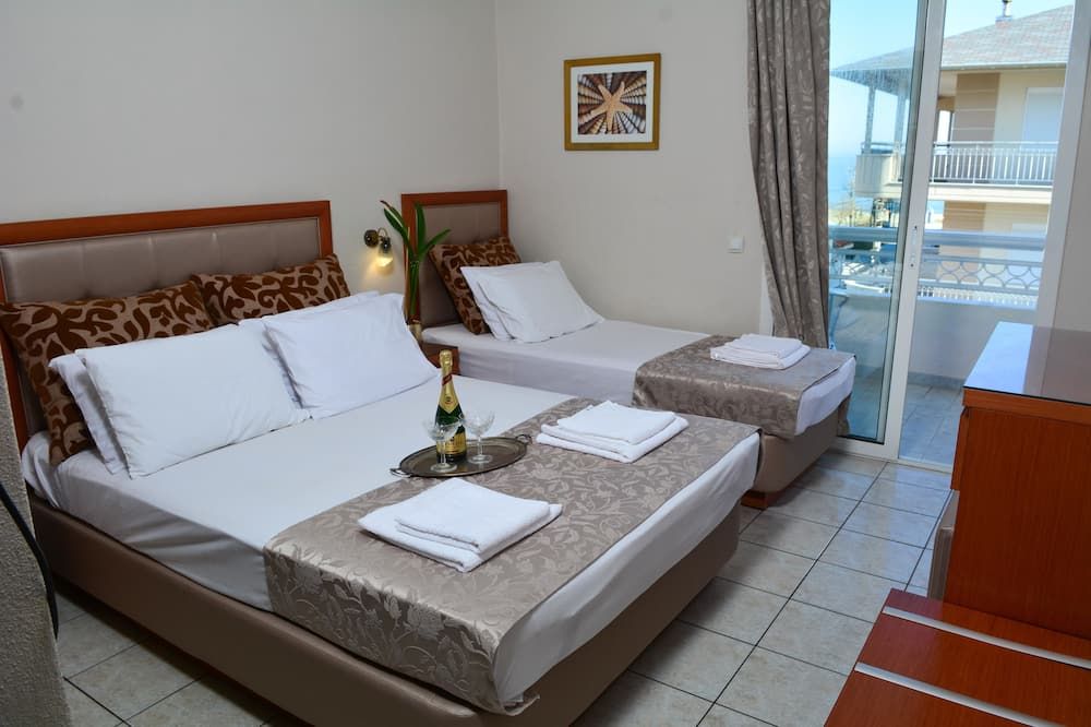 Hermes Rooms & Suites - Olympiaki Akti - Bedroom