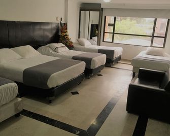 أوتل إيخيكوتيفو أفينيفا إسبيرانثا - بوغوتا - غرفة نوم