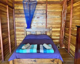 Magic place with ocean view & direct beach access - A wood house in paradise - Playa Negra - Bedroom