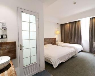 Xiyu Hostel · Cat Cafe - Guilin - Soverom