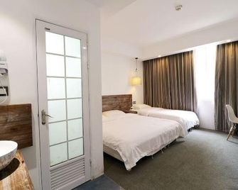 Xiyu Hostel · Cat Cafe - Guilin - Bedroom