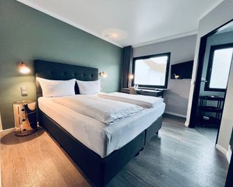 Rugs Hotel Köln - Colonia - Habitación