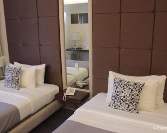 Segara Suites - Subic Bay Freeport Zone - Bedroom