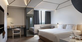 Gaia Cosmo Hotel - Yogyakarta - Phòng ngủ