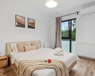 Maia Apartments - Bukarest - Schlafzimmer