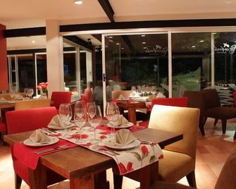 Rio Arriba Suites Apartments y Resto - Bella Vista - Restaurante