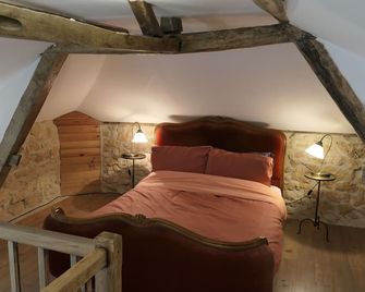 Le Moulin du Clapier- Gîte La Banette - Sorges-et-Ligueux-en-Périgord - Schlafzimmer