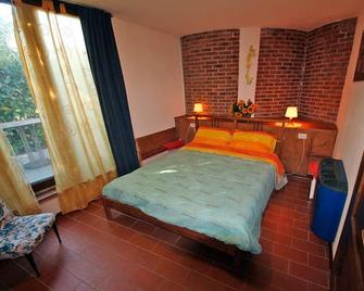Agriturismo Tiberio - Arezzo - Camera da letto