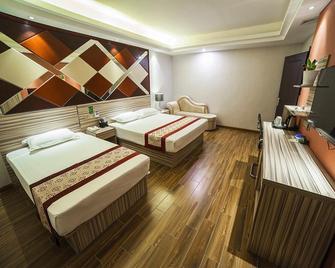 Junyi Hotel Jiangsu Yancheng Tinghu District Jinying International Shopping Center - Yancheng - Habitación