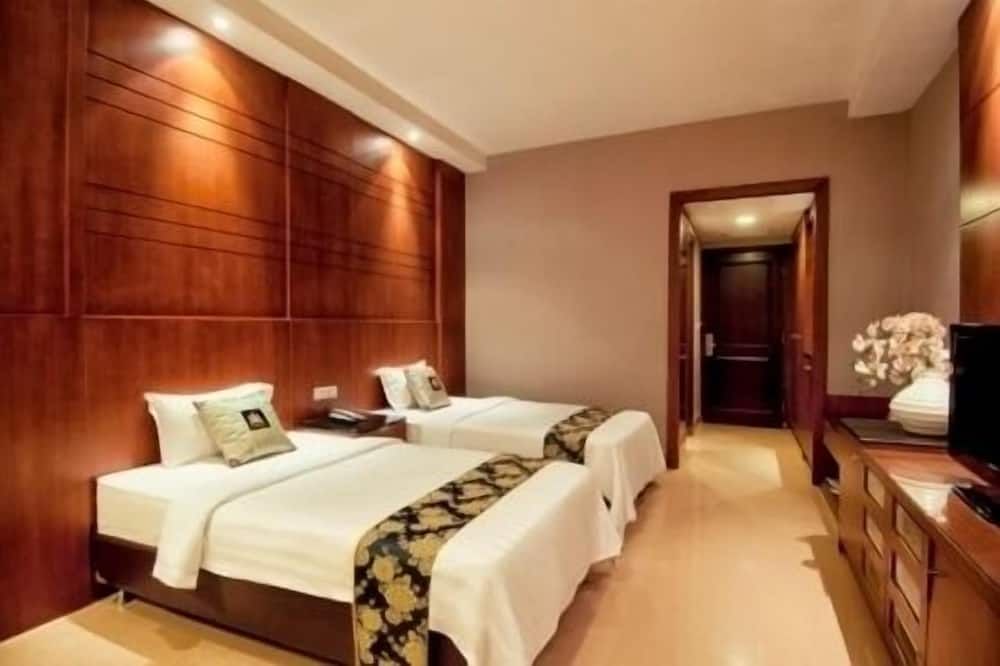 Grand Sakura Hotel - מדאן - חדר שינה