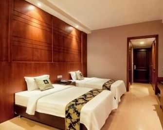 Grand Sakura Hotel - Medan - Phòng ngủ