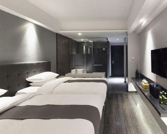Shenyang Holz Hotel - Šen-jang - Ložnice