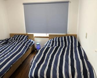 Condominium Wafu Tei Okinawa City - Okinawa - Bedroom