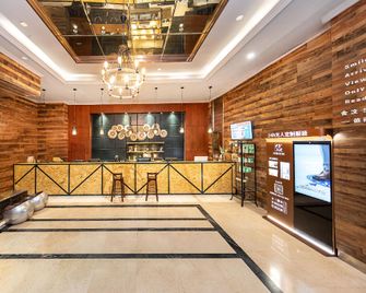 Savor Residence in Shewen City (Deyang Wanda Plaza Store) - Deyang - Front desk