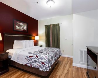 Red Roof Inn & Suites Wilson - Wilson - Soveværelse