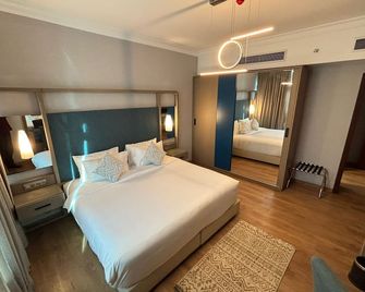 نايل سويتس بلازا هوتيل أبارتمنتس - القاهرة - غرفة نوم