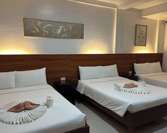 Zosimo's Inn - Lazi - Habitación