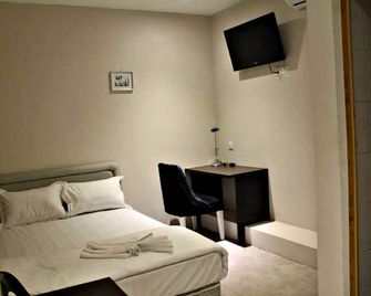 Lodge 37 - Ranau - Camera da letto