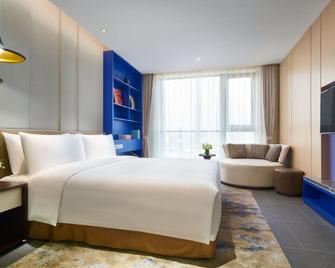 Q Hotel Haikou Meilan - Haikou - Habitación