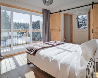 Station Farmhouse Tremblant - La Conception - Habitación