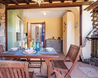 Casa Emozione With Shared Pool - Marinella - Dining room