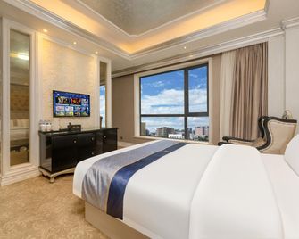 Mengjia Hotel (Ordos Wanda Plaza Central Hospital) - Ordos City - Ložnice
