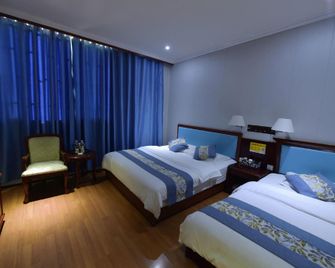 Ya'an Caiyuan Business Hotel - Ya'an - Bedroom