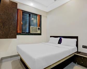 Hotel O Shubham Residency - Mumbai - Bedroom
