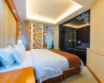 Kailai Hotel (Headquarter) - Dongying - Schlafzimmer