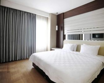 Hotel Harmoni Tasikmalaya - Tasikmalaya - Bedroom