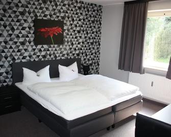 Hotel Haus Hubertus - Schneverdingen - Schlafzimmer