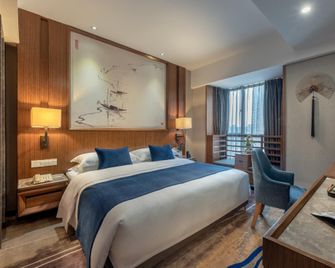 Changsha Yuelu Yannian Huijing Hotel - צ'נגשה - חדר שינה