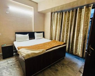 Goromgo Raj Golden & Restaurant Palampur - Pālampur - Schlafzimmer