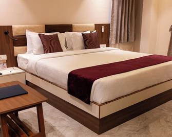 Freesia Resort by Express Inn - Nashik - Bedroom