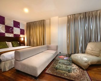 錦美假日大酒店 - 浮羅交怡 - 瓜鎮 - 臥室