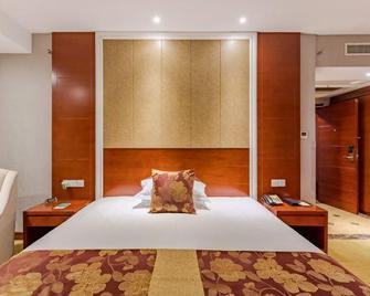 Wanyuan International Hotel - Anqing - Bedroom