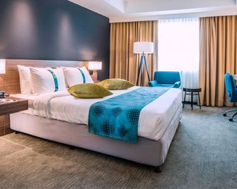 Grand Margherita Hotel - קוצ'ינג - חדר שינה