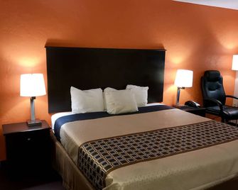 American Inn Anniston - Anniston - Bedroom