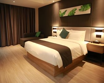 Up And in Hotel Hebei Hengshui Taocheng Baoyun Street - Hengshui - Schlafzimmer
