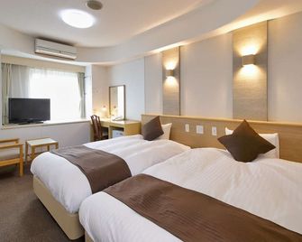 Hotel Palm Spring - Iwaki - Habitación