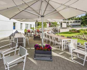 Novotel Suites Genève Aéroport - ג'נבה - פטיו