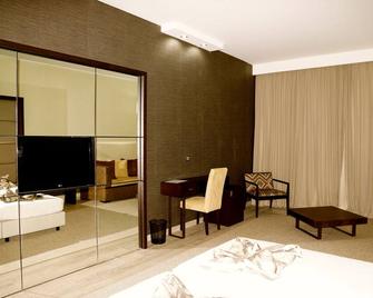 Hotel Praia Confort - Praia - Bedroom