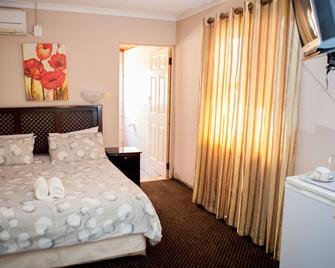 Oria Lodge - Edgemead - Bedroom