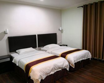 Han Palace Hotel Semporna - Semporna - Bedroom