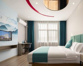 Zhenpin Hotel - Shangrao - Bedroom