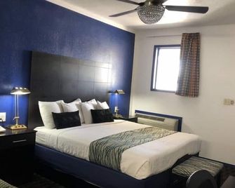 Budget Inn & Suites - אוקלהומה סיטי - חדר שינה